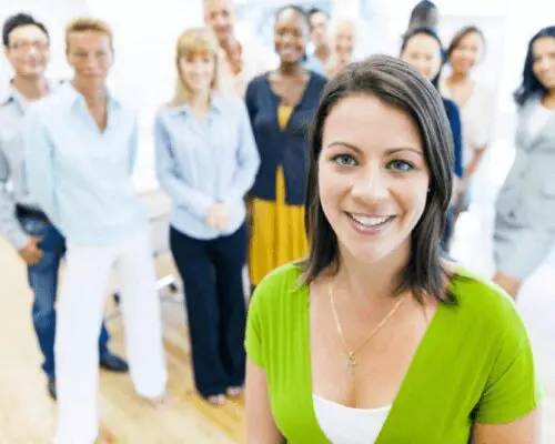 A group of people standing in front of each other.